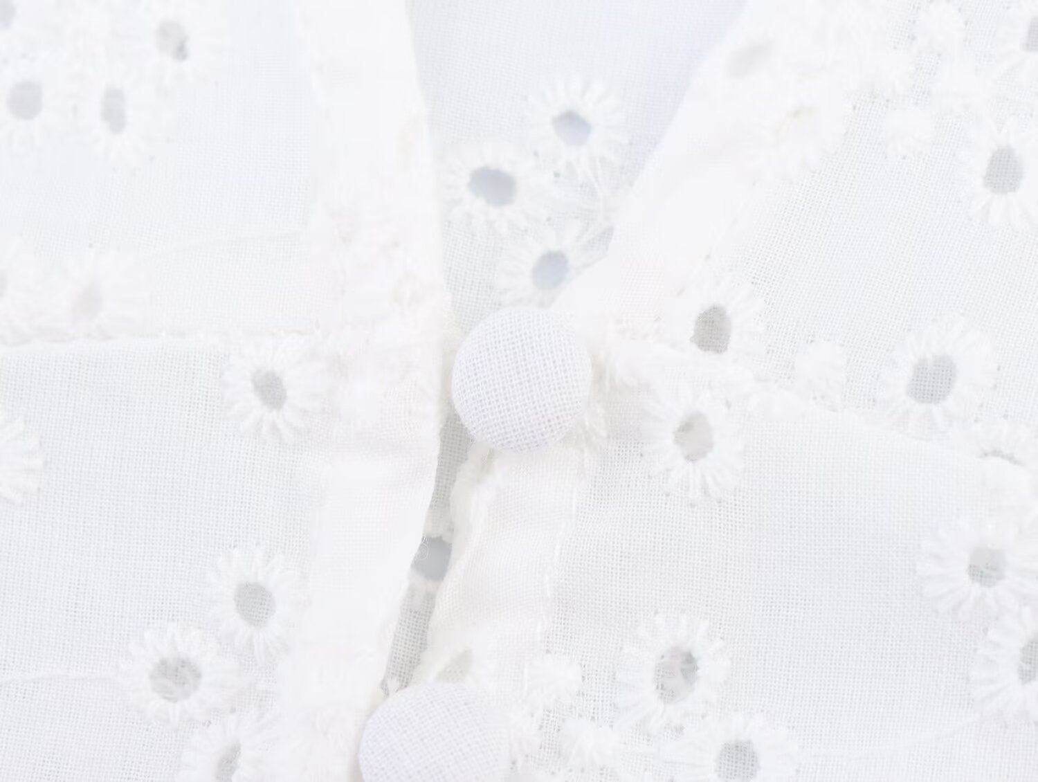 Women's hollowed out embroidered V-neck shirt