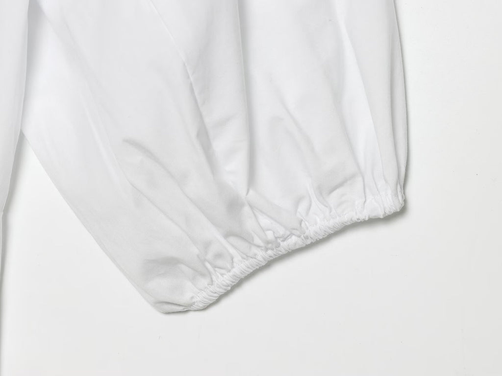 Women's skirt style hem bubble sleeve shirt