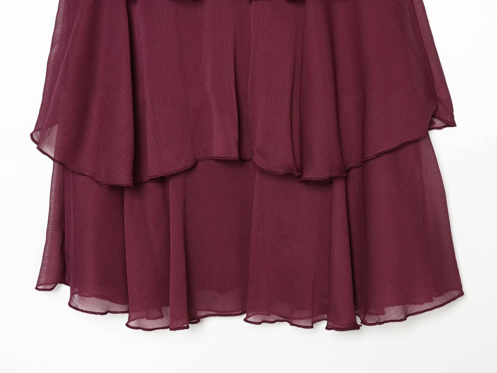 Women's sleeveless draped cake dress