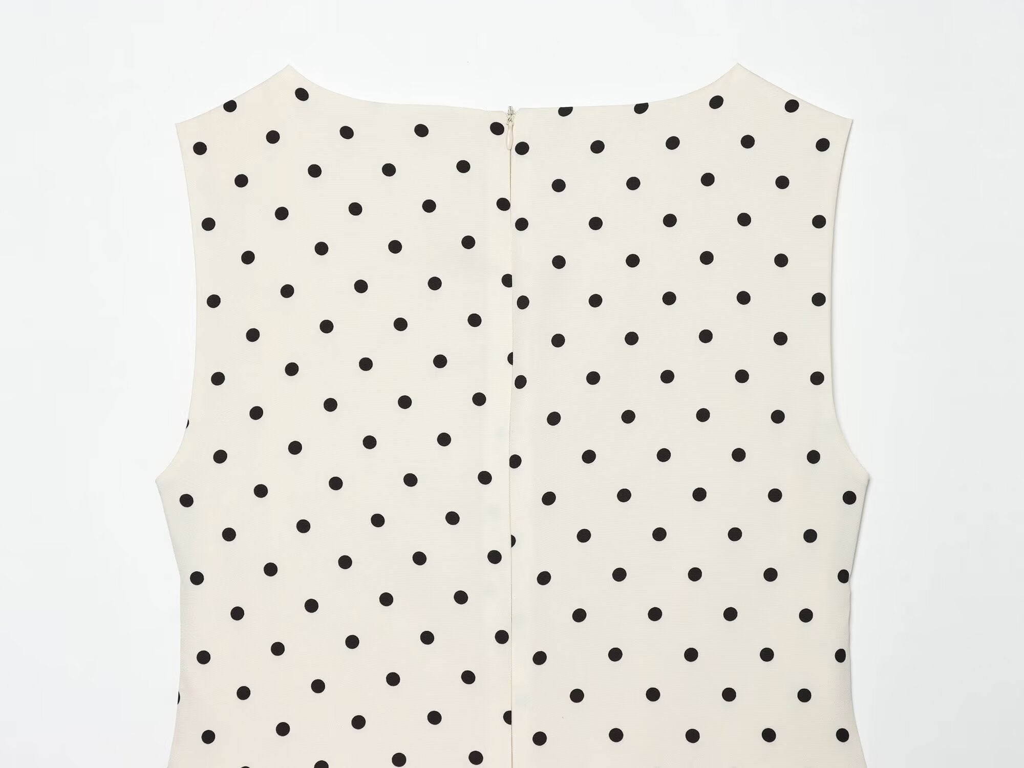 Women's ruffled hem polka dot sleeveless top