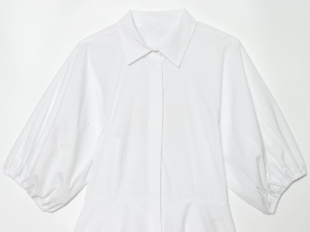 Women's skirt style hem bubble sleeve shirt