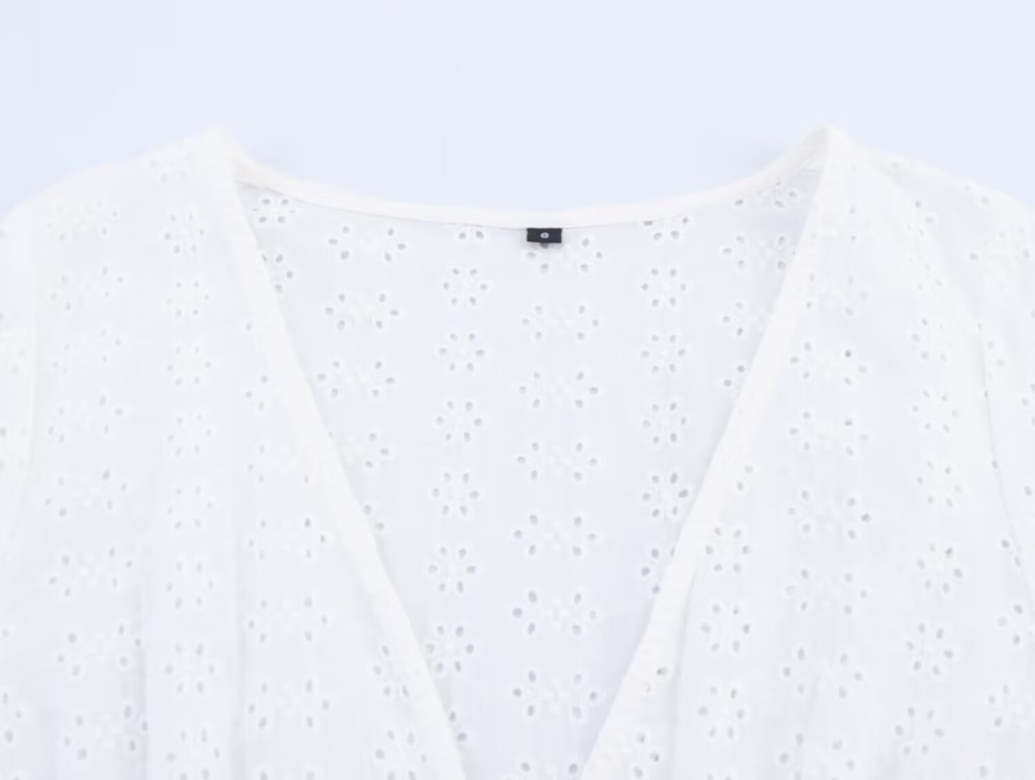 Women's hollowed out embroidered V-neck shirt