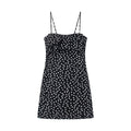 Women's sleeveless polka dot suspender dress