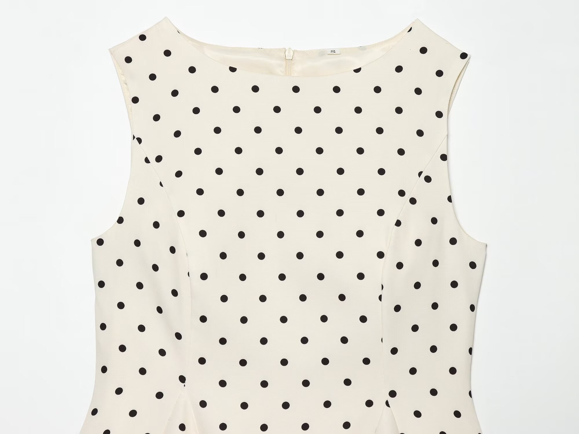 Women's ruffled hem polka dot sleeveless top