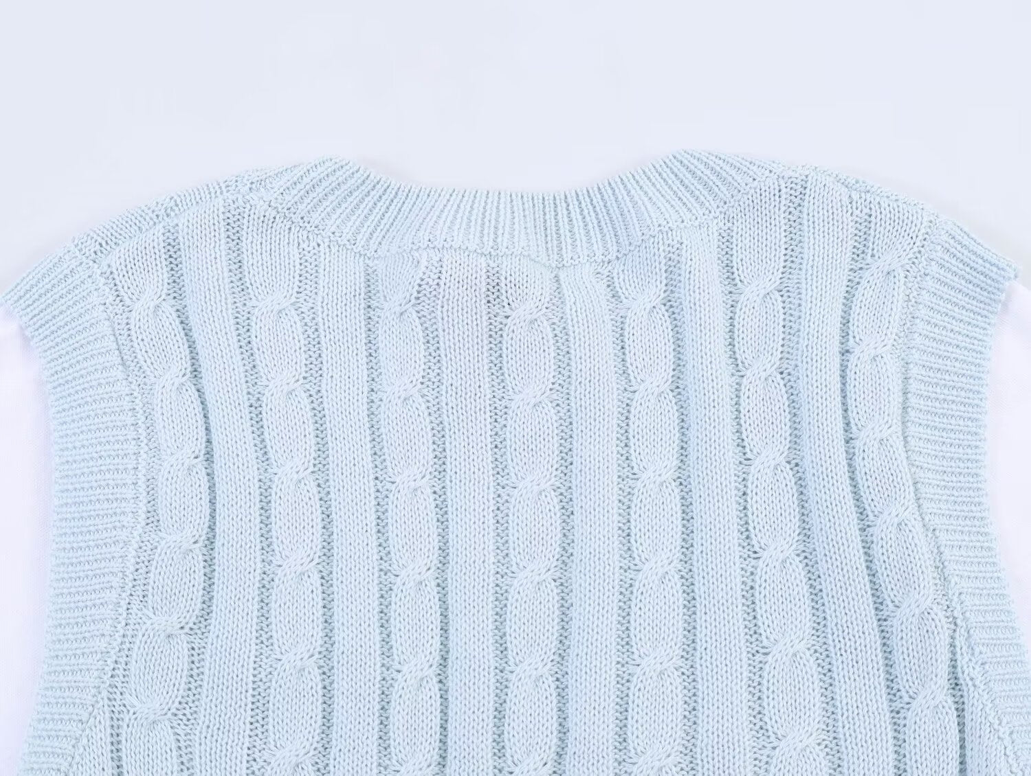 Women's contrasting fake two-piece knitted sweater