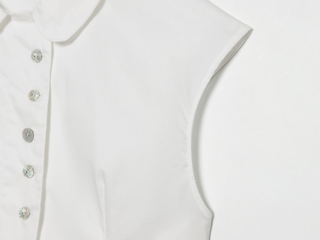 Women's breasted decorative sleeveless lapel top