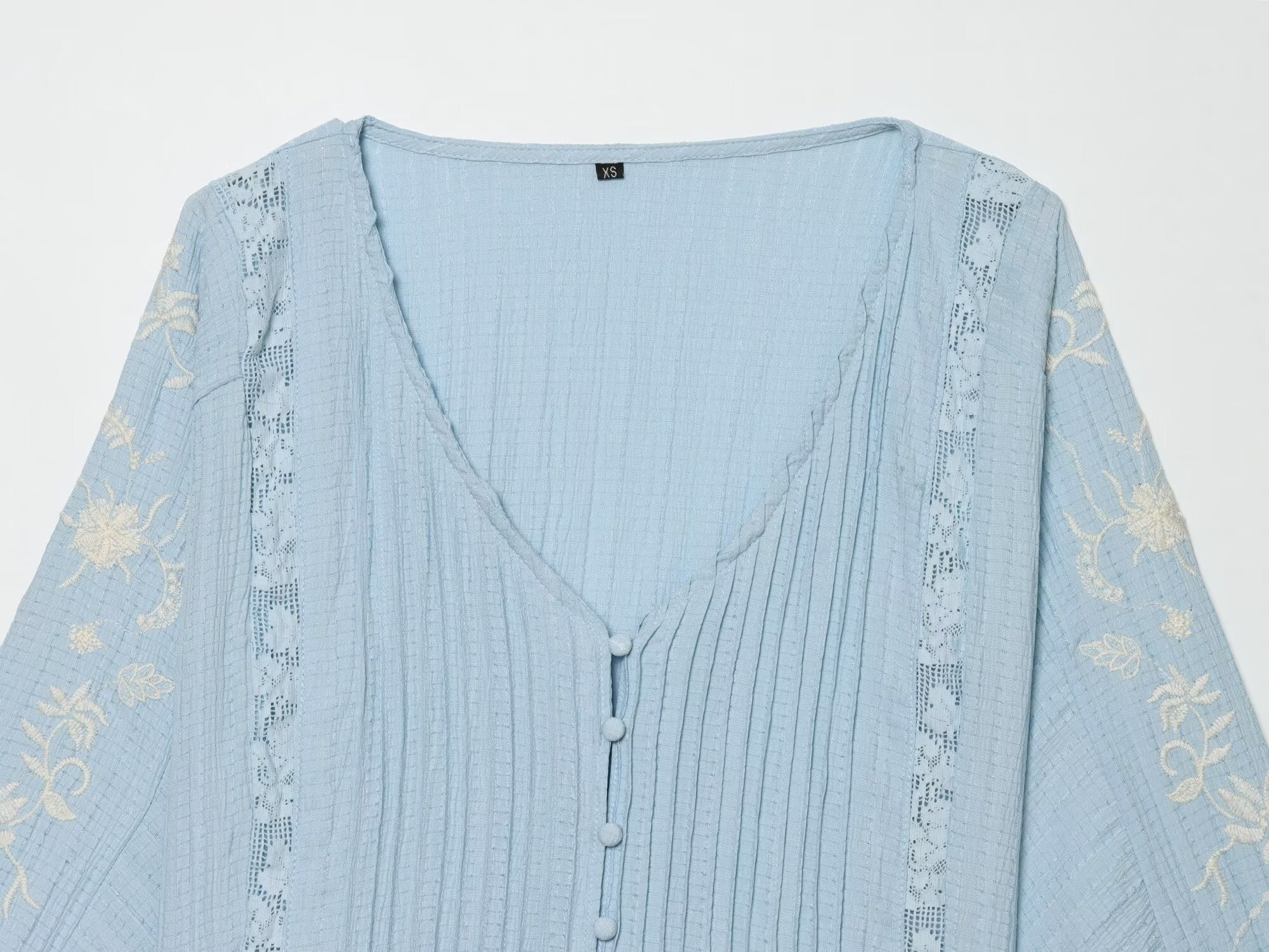 Women's contrasting embroidered V-neck shirt
