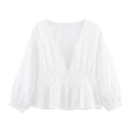 Women's hollowed out embroidered V-neck shirt